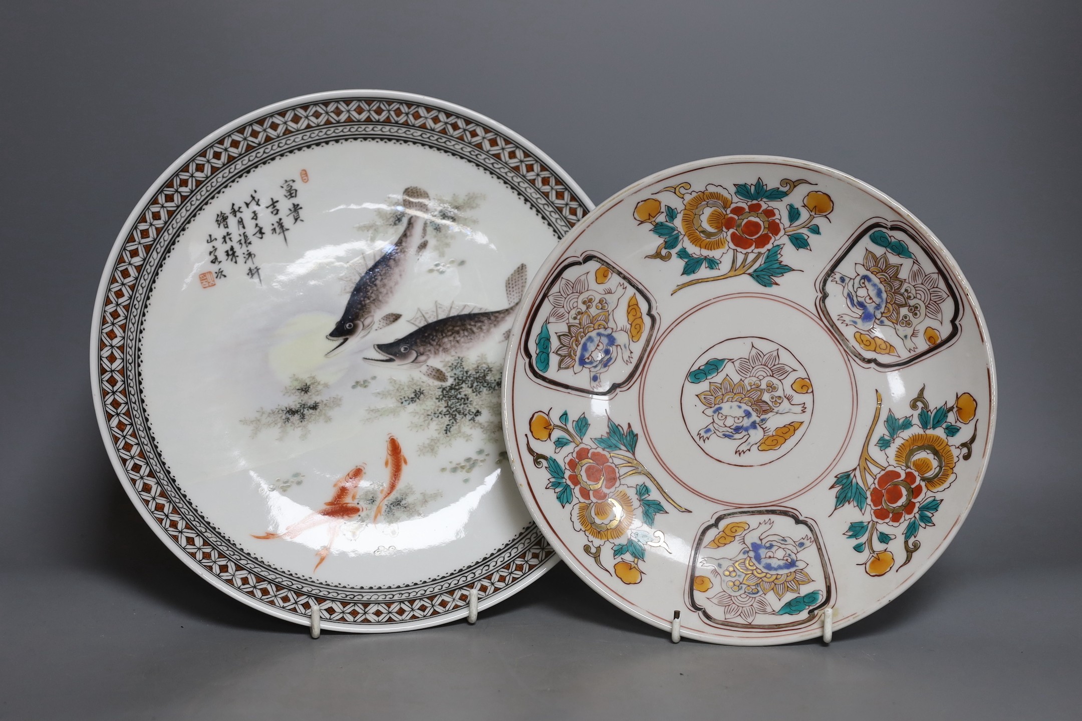 Two Chinese enamelled porcelain dishes, largest 27.5 cms diameter.